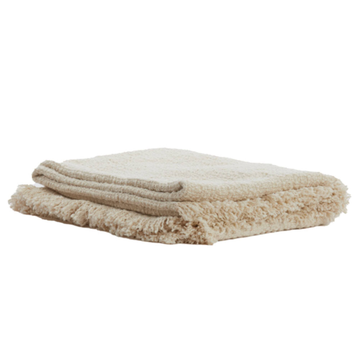 Miraso throw's woven texture, showing the intricate cotton weave and delicate fringed edges in a soft natural shade.