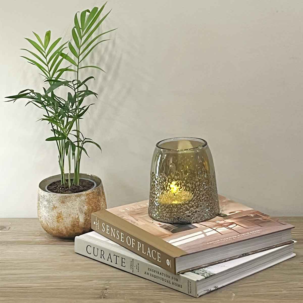 Parata Smoked Tealight Holder - Placed on books