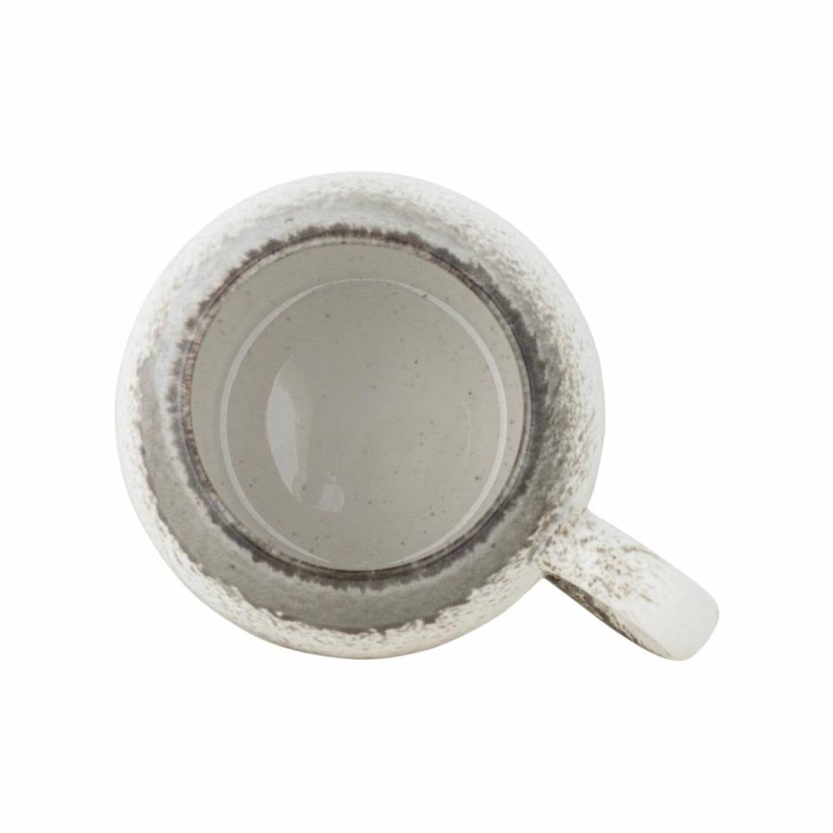 Paula stoneware mug with reactive glaze in grey and white - Top view on white background