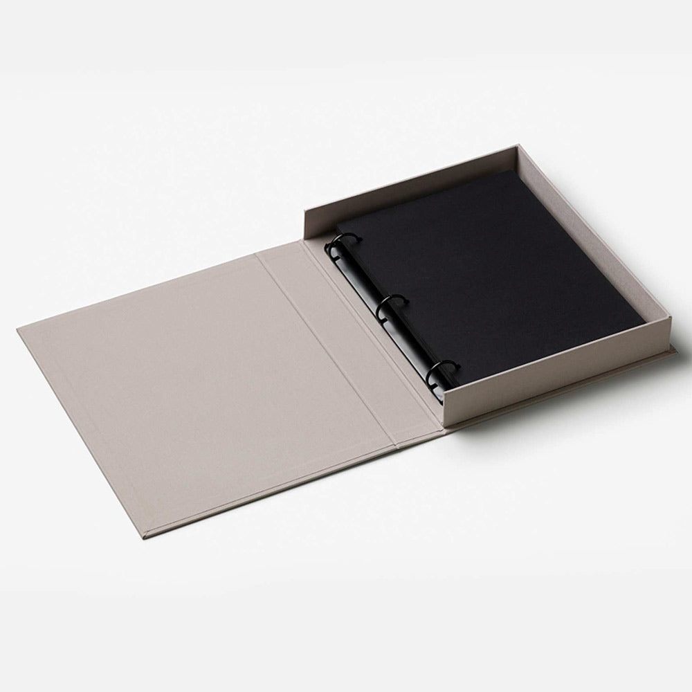 Good Times Photo Album in grey opened to show black interior on a white background