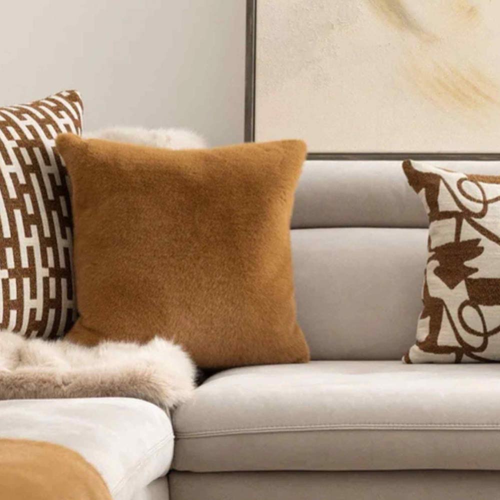 Ralph Square Cushion in Cognac - Displayed on Sofa