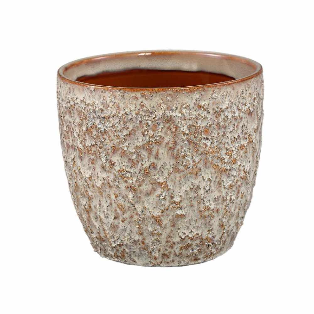 Textured ceramic pot on a white background