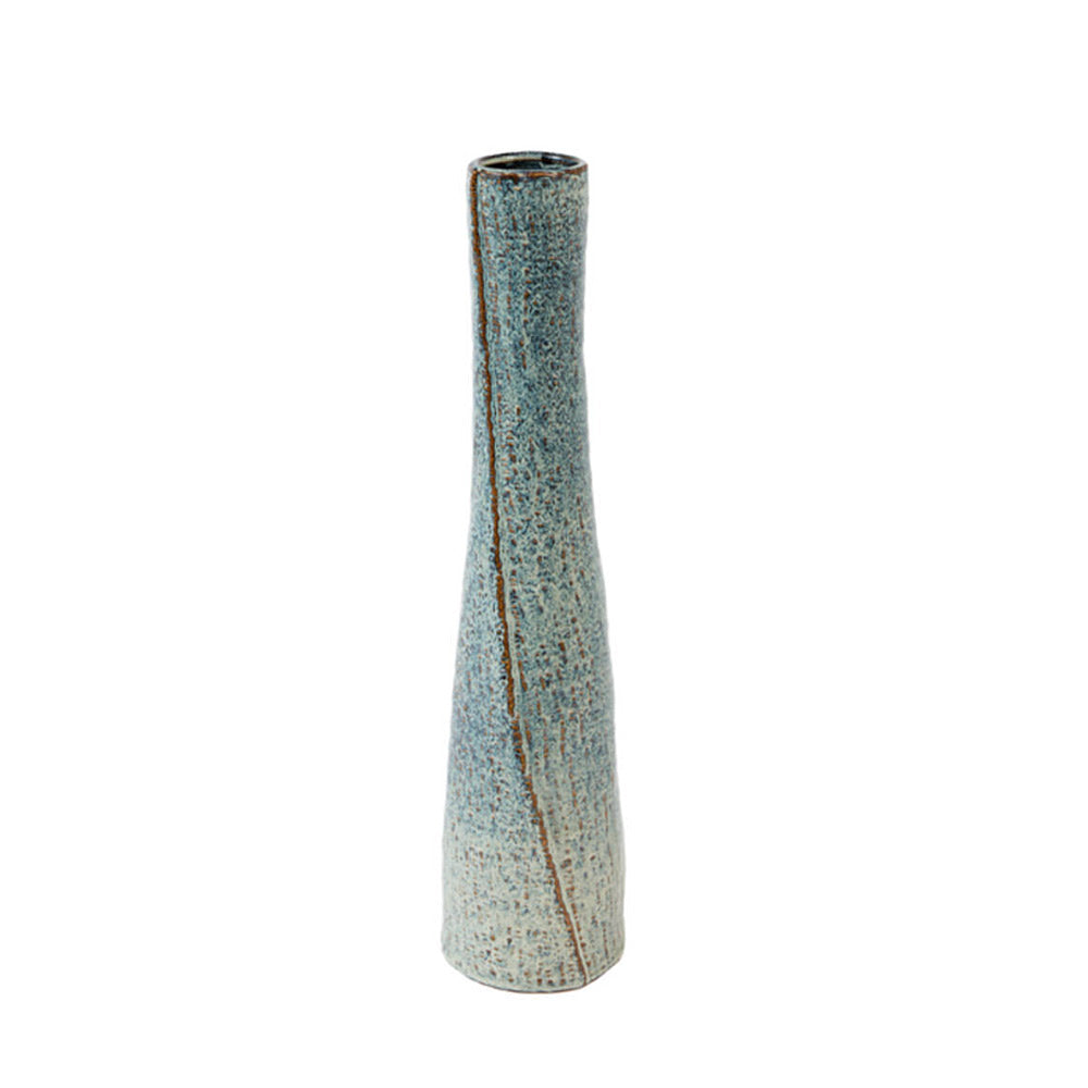 A tall, slender ceramic vase with a textured, blue and brown  gradient of a glaze and a vertical twisting line running down the central area, shown on a plain white background.