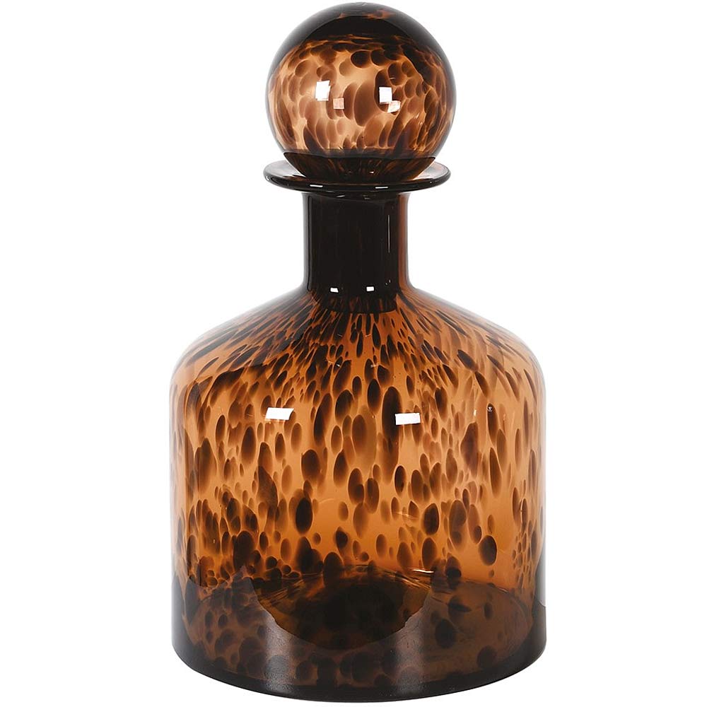 A brown glass bottle vase with a tortoise print and a ball top.