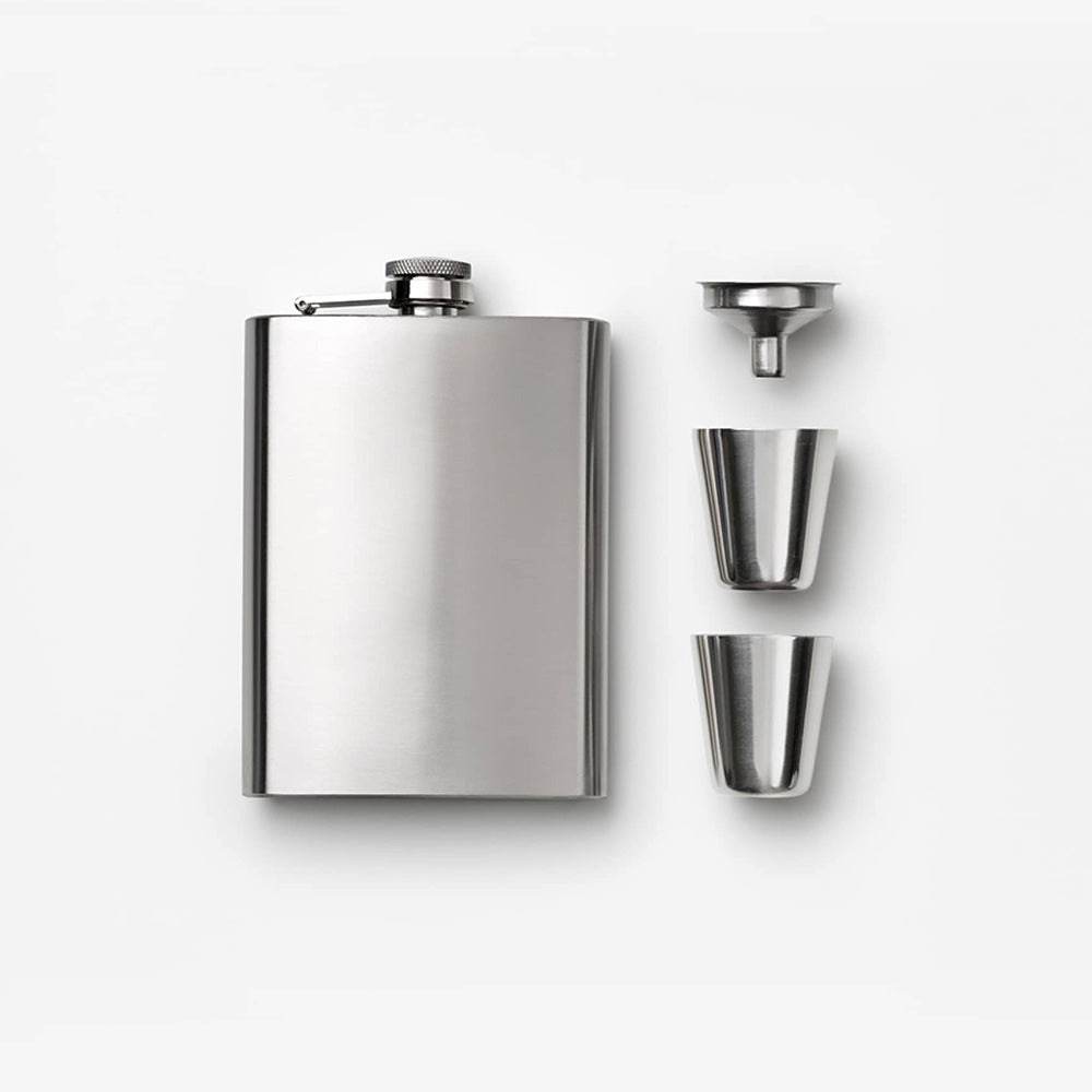 The Essentials - Quality Hip Flask and shot Gift Set - Stainless steel flask with two shot glasses and a funnel on a white background