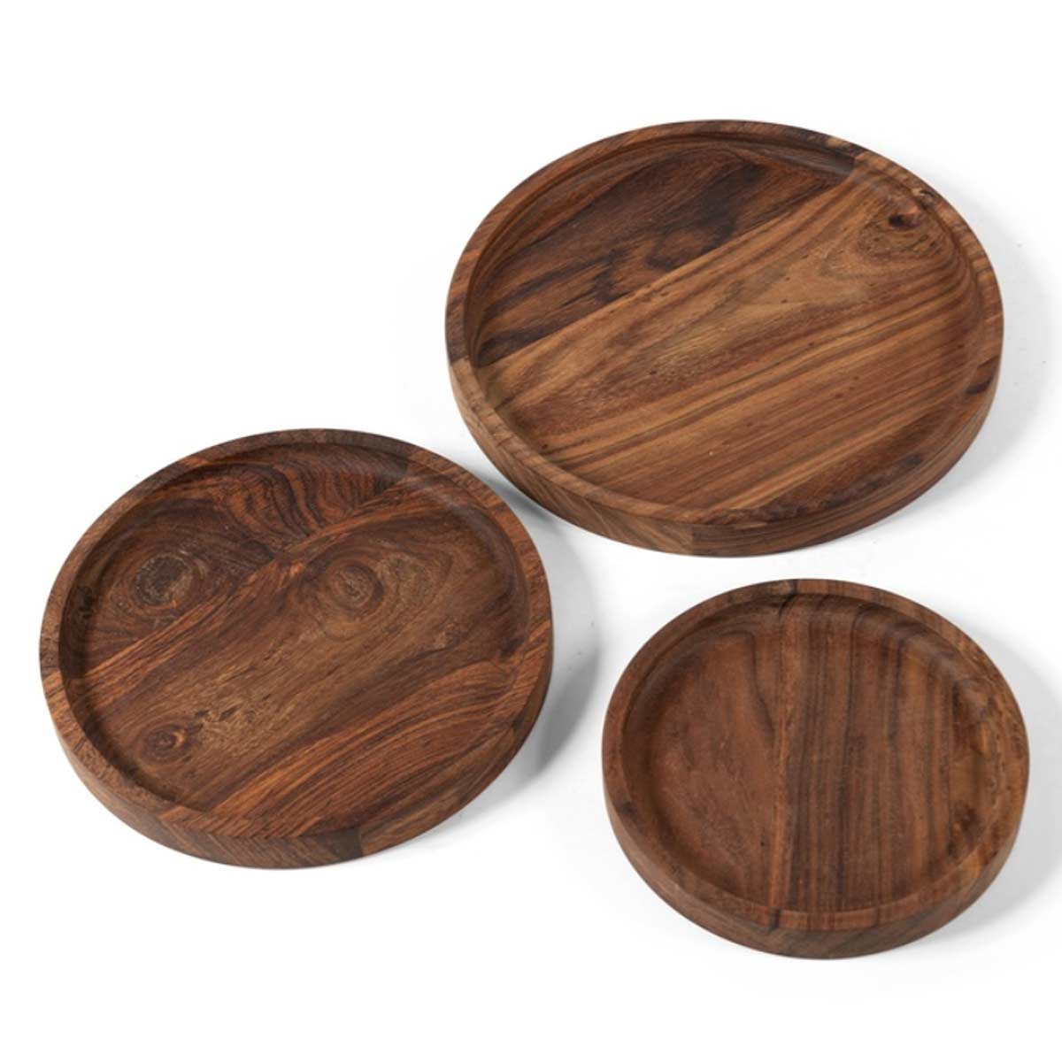 Three round acacia wood trays in small, medium, and large sizes, ideal for serving or displaying candles and decorative items.