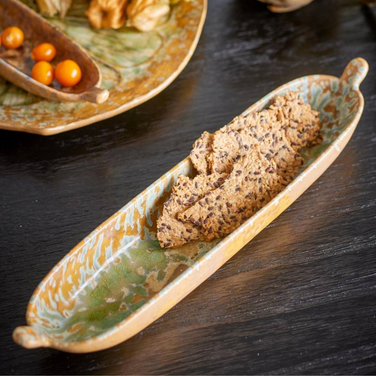 Milani Shallow Serving Dish with bread, green and gold reactive glaze